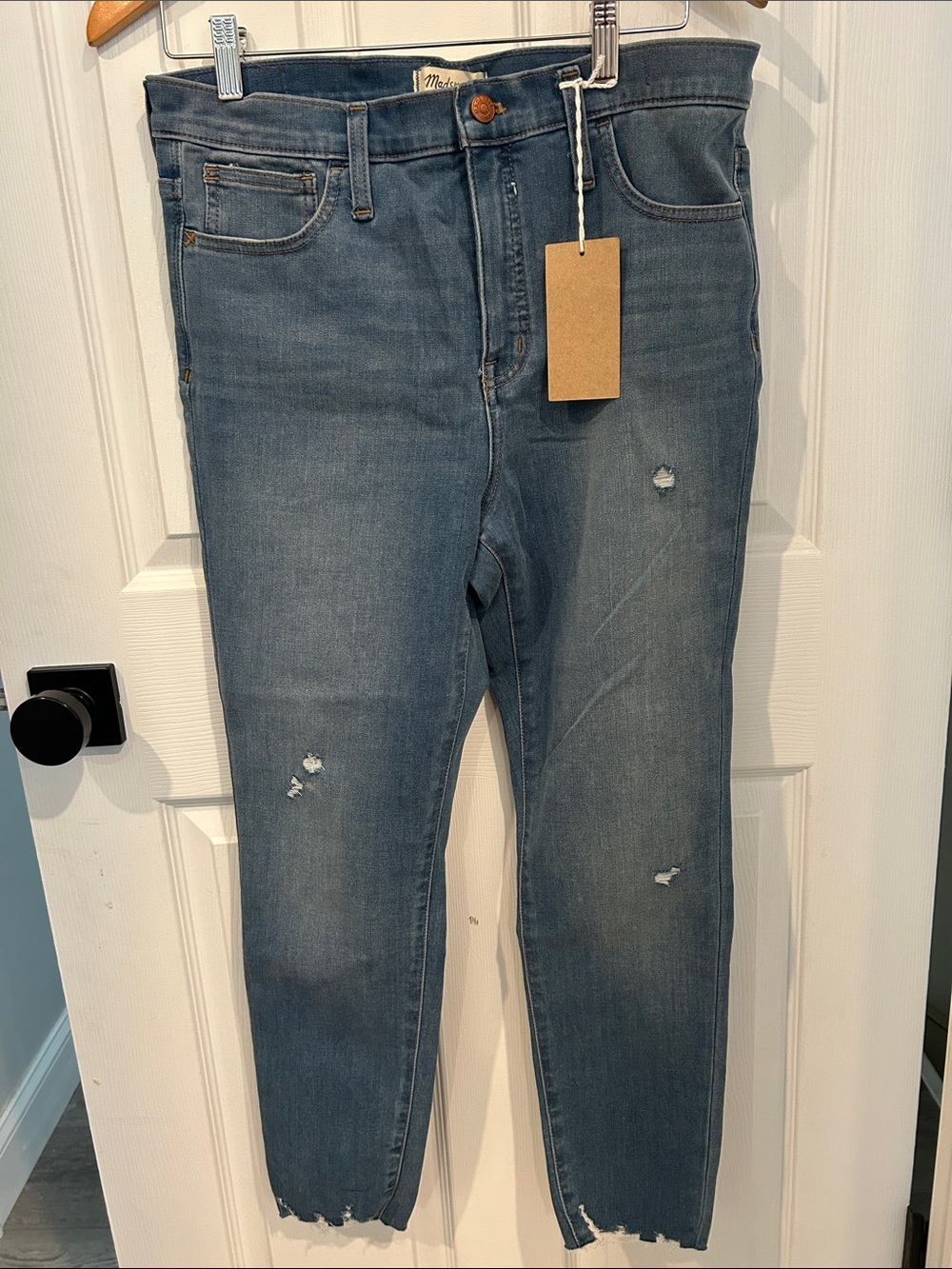 Madewell Women’s Jeggings in Faded Blue with Light Distressing